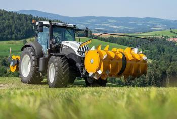 MAMMUT silage spreader and silage roller on a tractor